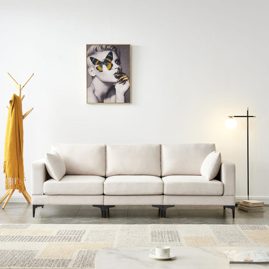 ANEK 3 Seater Beige Fabric Sofa with modern design, shown in living room with art and floor lamp